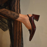 Burgundy high-heeled shoes